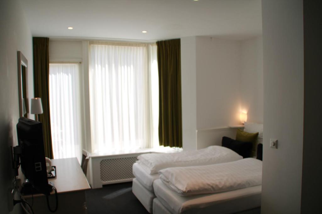 Hotel De Doelen Leiden Pokoj fotografie